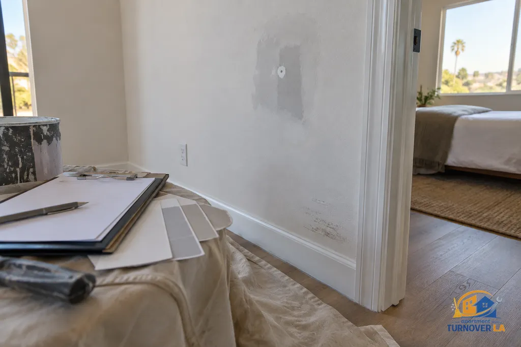 Drywall patch and paint scope review during an LA rental turnover bedroom inspection